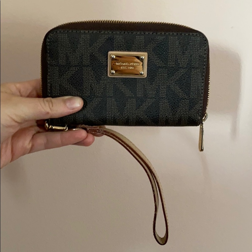 Lightly used MK wristlet for phone
